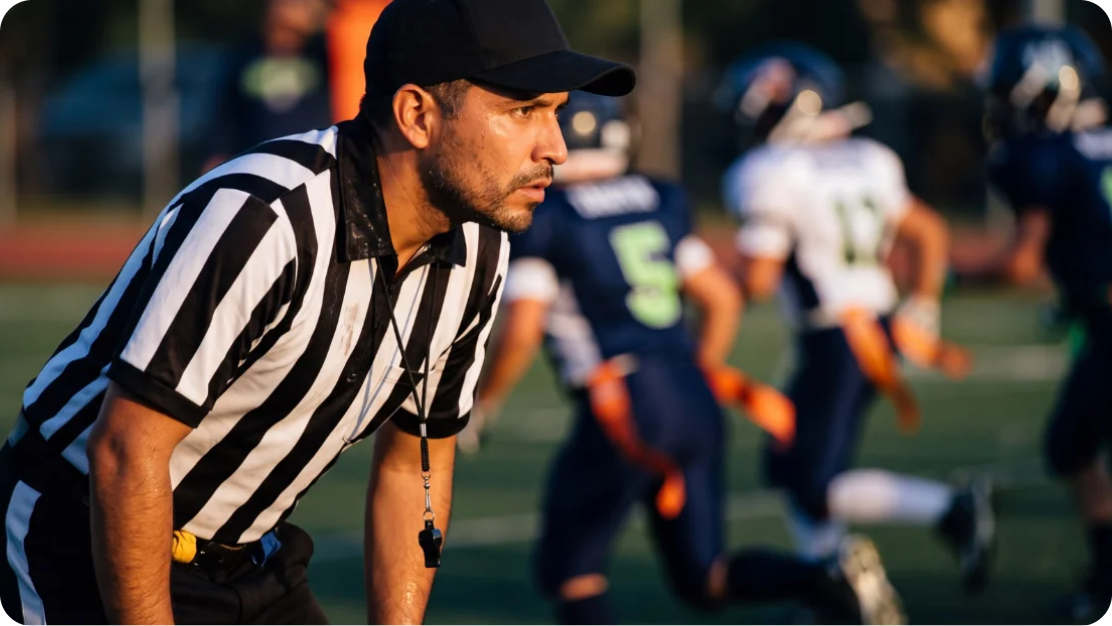 Jugada de football americano infantil